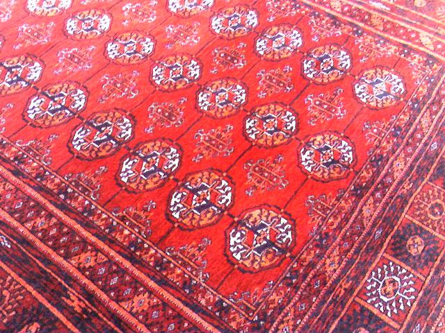 The Teke design Turkmen carpet. This pattern is often referred to as the Bukhara print design.